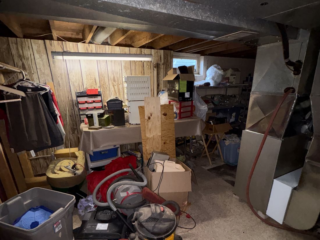 Basement filled with decades of accumulated tools and storage in Cudahy, WI