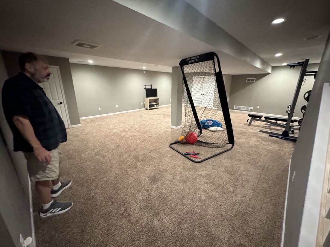 Finished lower-level recreation room in the Germantown, WI property