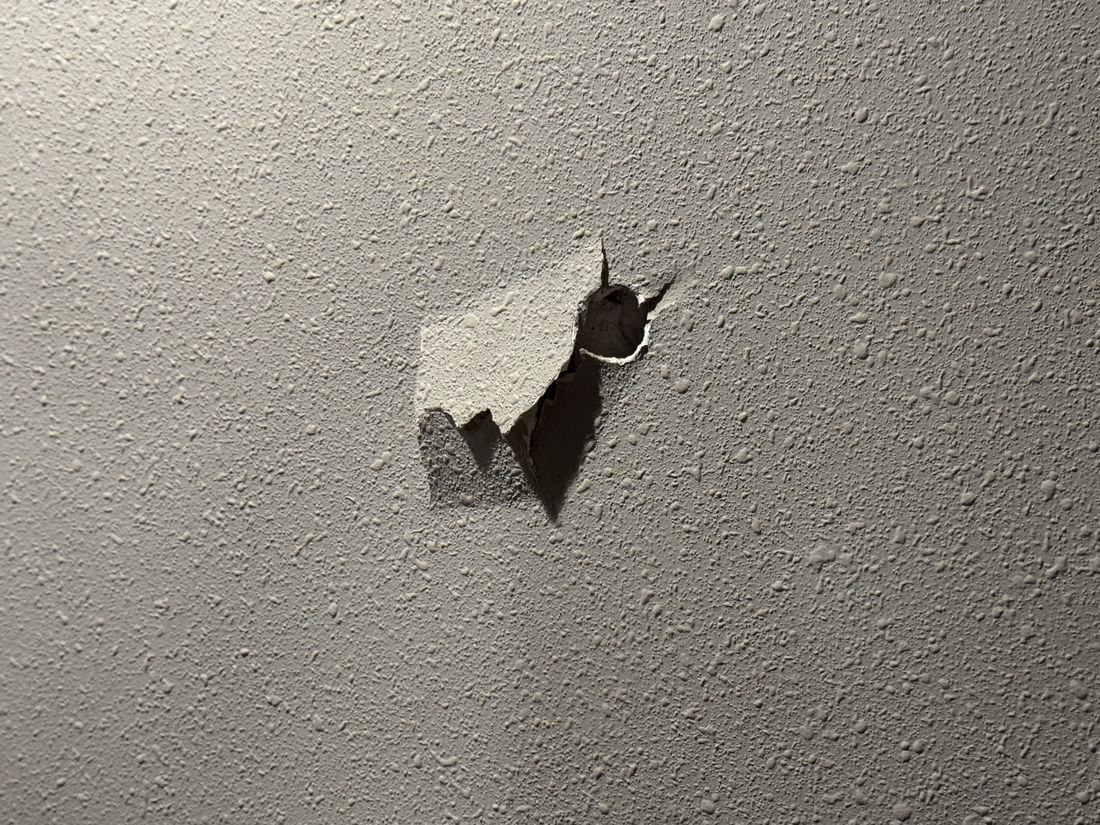 Drywall damage requiring cosmetic repair in the Germantown property
