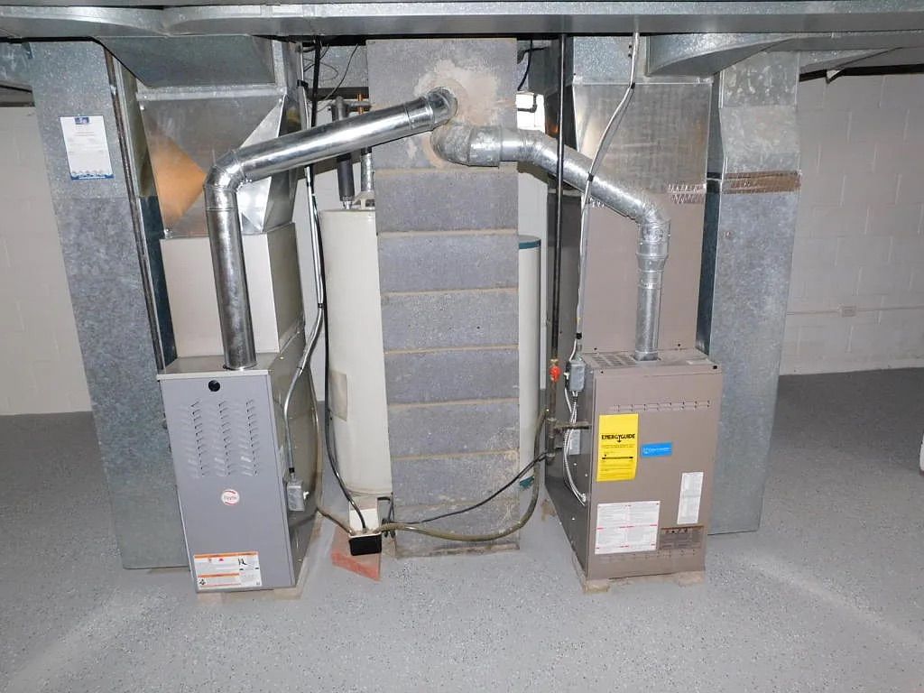 Two separate furnace systems in the basement — the legacy of the property's duplex origins