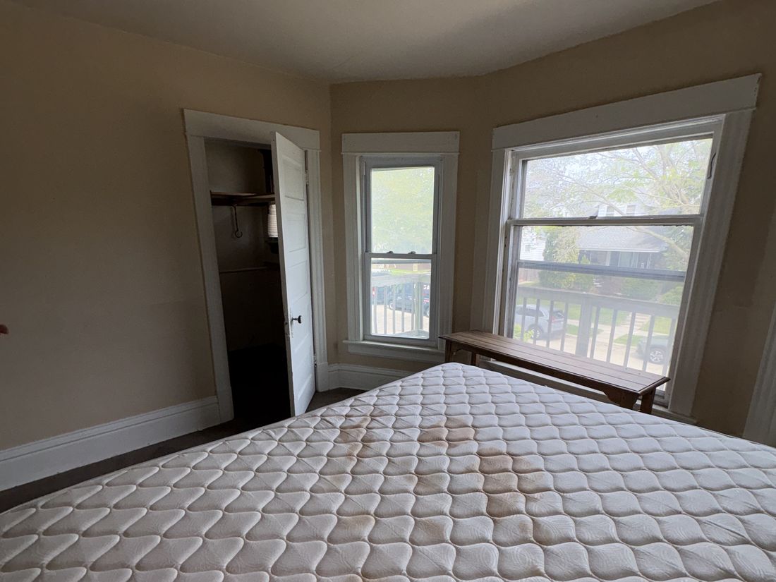 Bedroom in the West Allis duplex photographed in as-purchased condition
