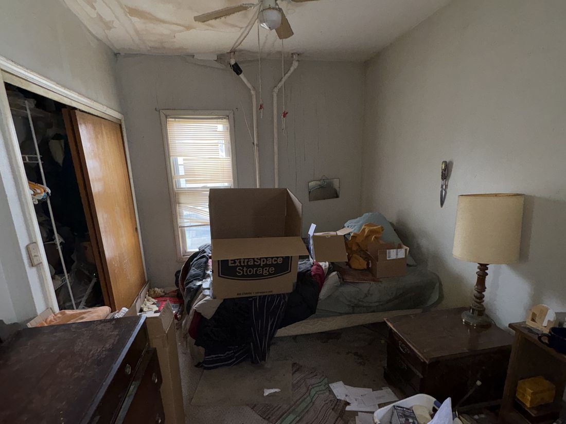 Water staining spreading across the ceiling of the lower unit in West Allis, Wisconsin
