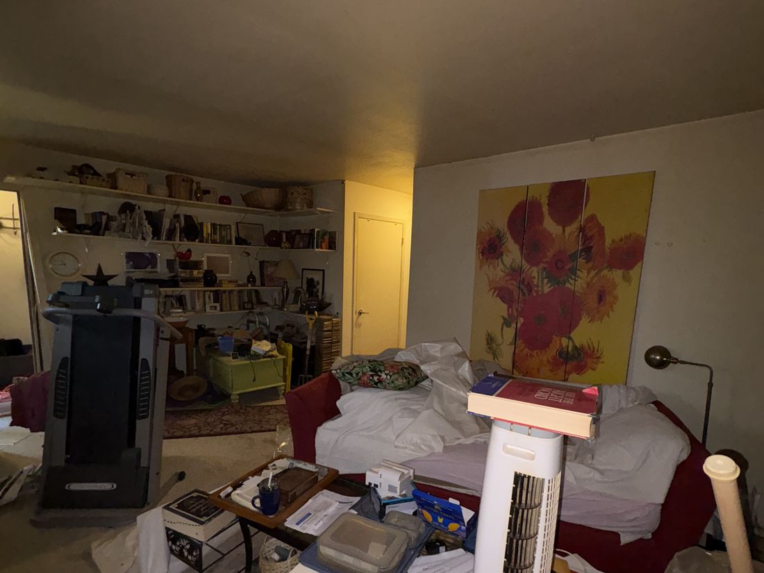 Bedroom with household contents still in place in the West Allis estate duplex